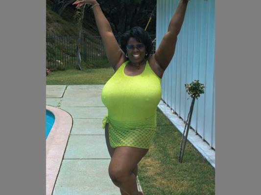 Shar Nitzapanus Black BBW Shows Off Her Jumbo Jugs in a Swimsuit