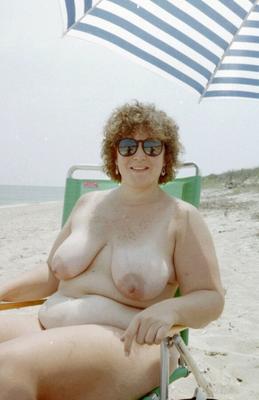 Mature fatty on the beach