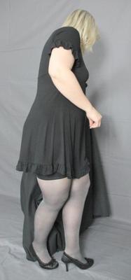 Chubby lady posing in stockings