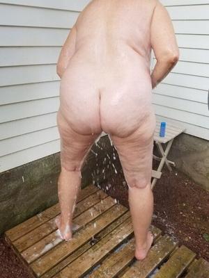 Nancy showering outdoors